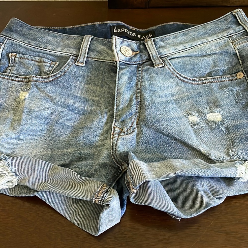 Barely worn distressed express jean shorts.